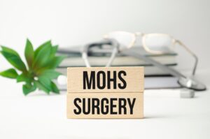 Wood blocks say Mohs surgery, which our WV doctor performs expertly
